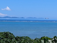浮いて見える伊是名島 2024/07/04 10:09:54