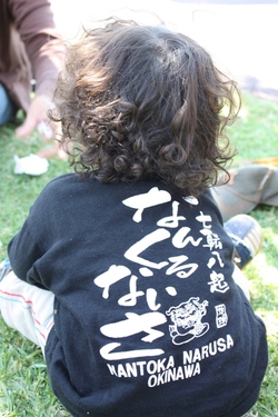 背中で語る